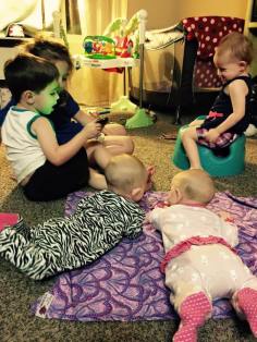 five kids in playroom